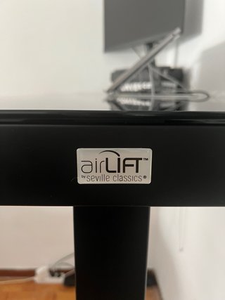 Mesa de trabajo elevable cristal y metal