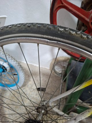 Bicicleta Orbea verde y amarilla