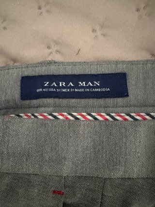 Traje de caballero. Chaqueta T.52 y pantalón T.42.