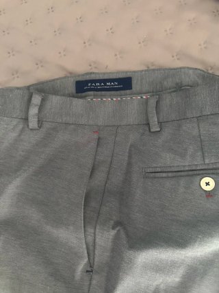 Traje de caballero. Chaqueta T.52 y pantalón T.42.