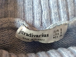 Jersey Stradivarius cuello alto de mujer