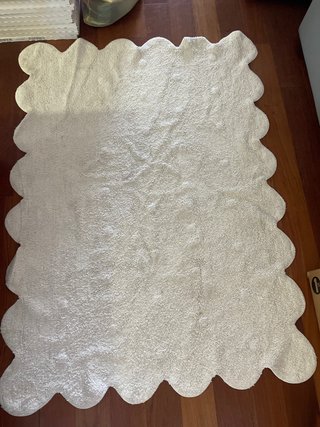 Alfombra beige galletas tela