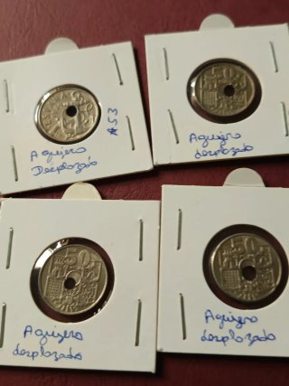 50 céntimos 1949 error agujero desplazado