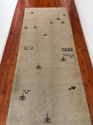 2 Alfombras beige y negra con diseño