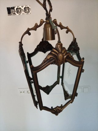 Farol colgante dorado y transparente