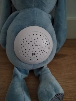 Muñeco proyector luz y sonido estrellas
