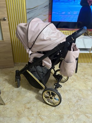 Cochecito bebé rosa