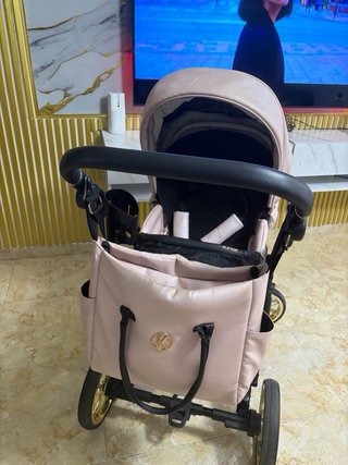 Cochecito bebé rosa