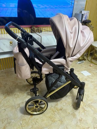 Cochecito bebé rosa