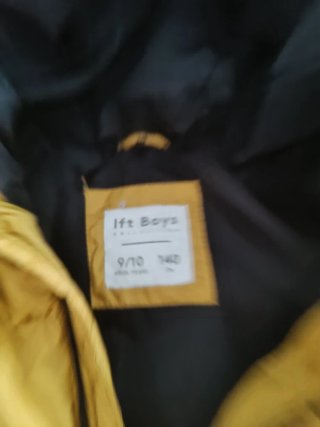 Chaqueta plumífero niño amarilla