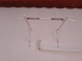 Máquina de dominadas para pared