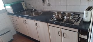 Muebles de cocina modulares beige y negro