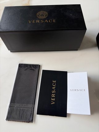 Occhiali da sole Versace oro scuro grigio