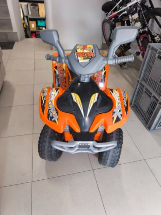 Moto infantil eléctrica naranja