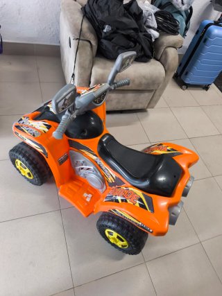 Moto infantil eléctrica naranja