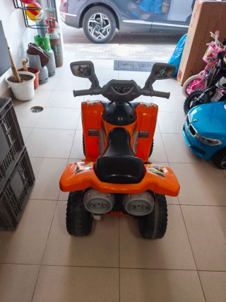 Moto infantil eléctrica naranja