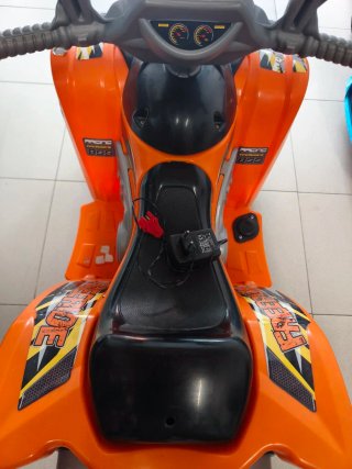Moto infantil eléctrica naranja