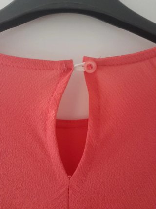 Blusa coral con volantes talla L
