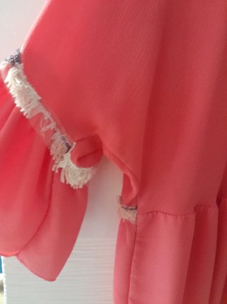 Blusa coral con volantes talla L