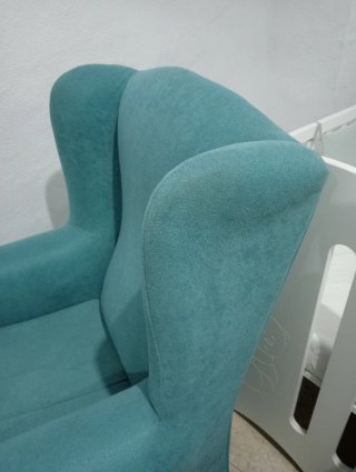 Sillón de lactancia mecedora