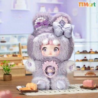 Bambola Nommi con vestito viola