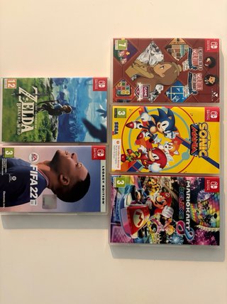 Nintendo Switch + Juegos y Accesorios