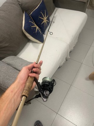 Caña de pescar con carrete