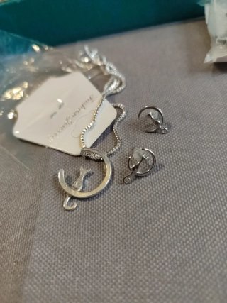Pendientes acero con brillante negro pluma colgant