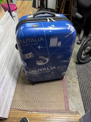 Maleta mediana azul con diseño de estrellas