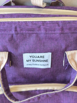 Mochila cambiador bebé púrpura
