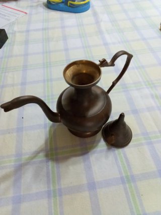 Tetera metálica decorativa