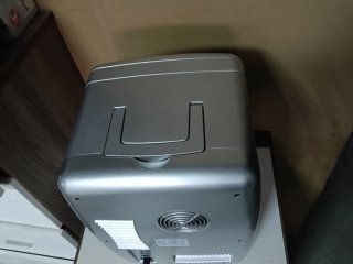Mini nevera portátil plateada 220v y 12 v