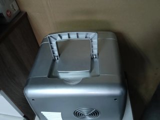 Mini nevera portátil plateada 220v y 12 v