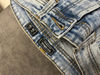 Jeans strappati uomo taglia 30
