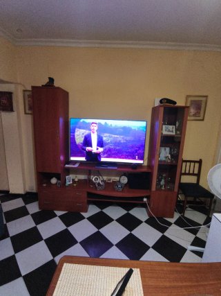 Mueble de salón madera y cristal