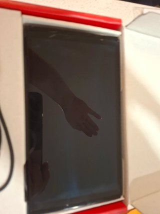 Nintendo Switch OLED azul y roja más otro mando