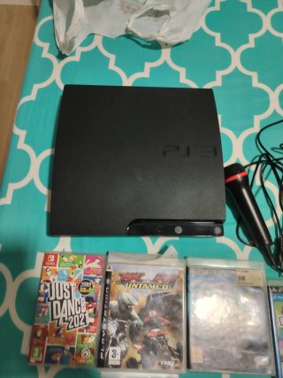 Consola PS3 con juegos y mando