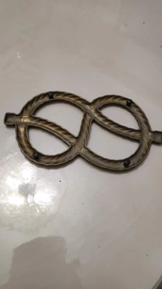 Salvamanteles nudo marinero latón