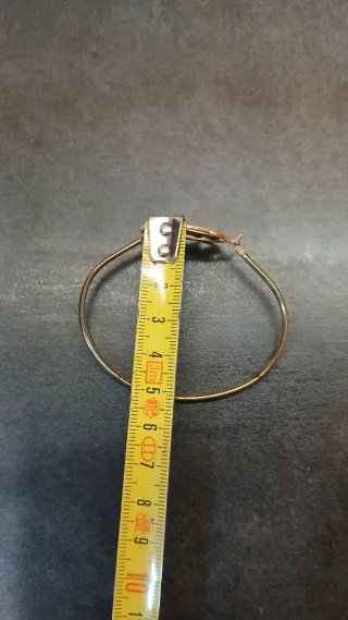 Pulsera dorada con colgante de elefante
