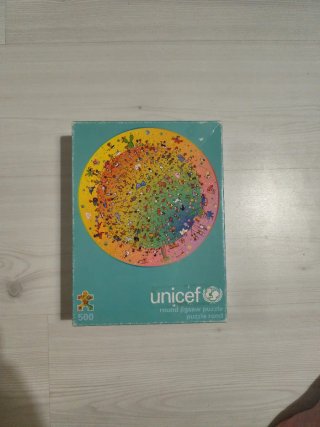 Puzzle redondo UNICEF 500 piezas, le falta una