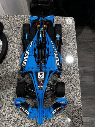 Coche de carreras azul tipo Lego