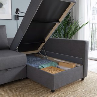 Sofá cama gris con colchoneta