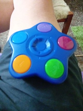 Juguete electrónico estrella con botones
