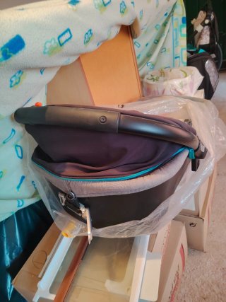 Carro de bebé con capazo y bolso