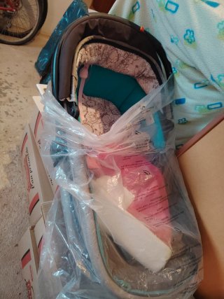 Carro de bebé con capazo y bolso