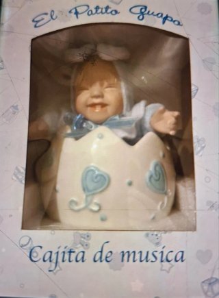 Caja de música El Patito Guapo En rosa y otro azul