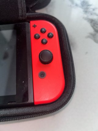 Nintendo Switch + custodia + giochi