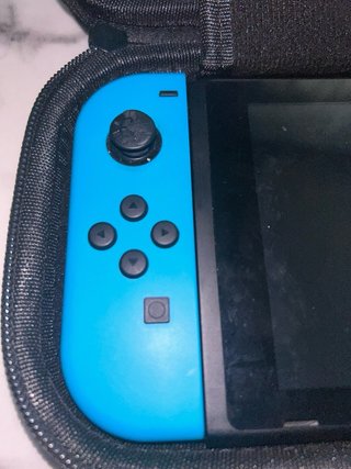 Nintendo Switch + custodia + giochi