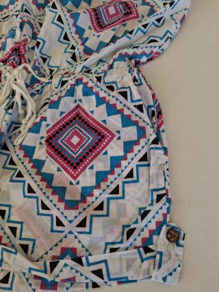 Tuta corta estiva fantasia geometrica