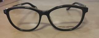 Gafas Carolina Herrera Negras y dorado.